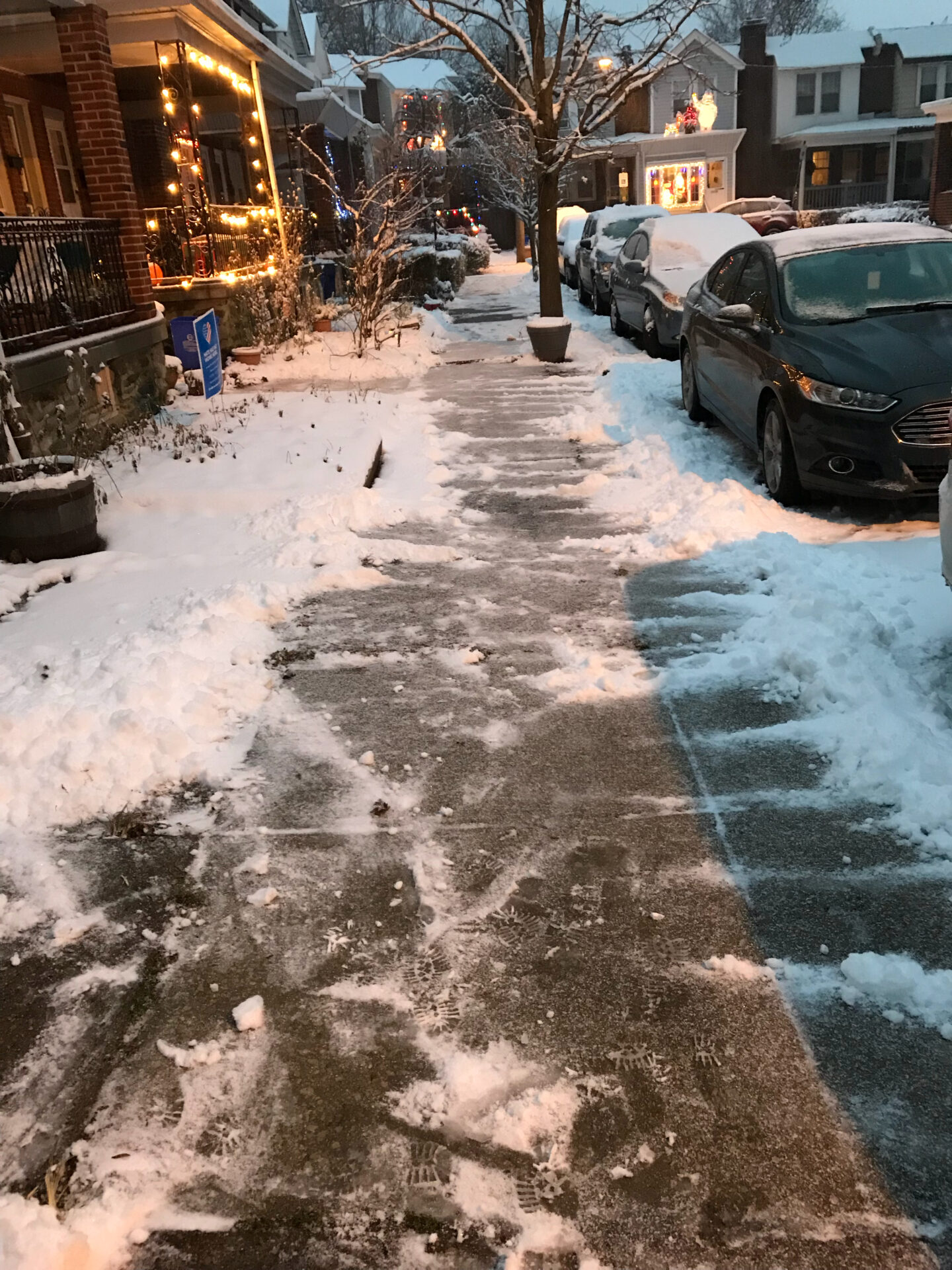 helping to shovel snow