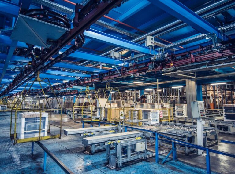 A Manufacturing plant floor with rows of workstations.