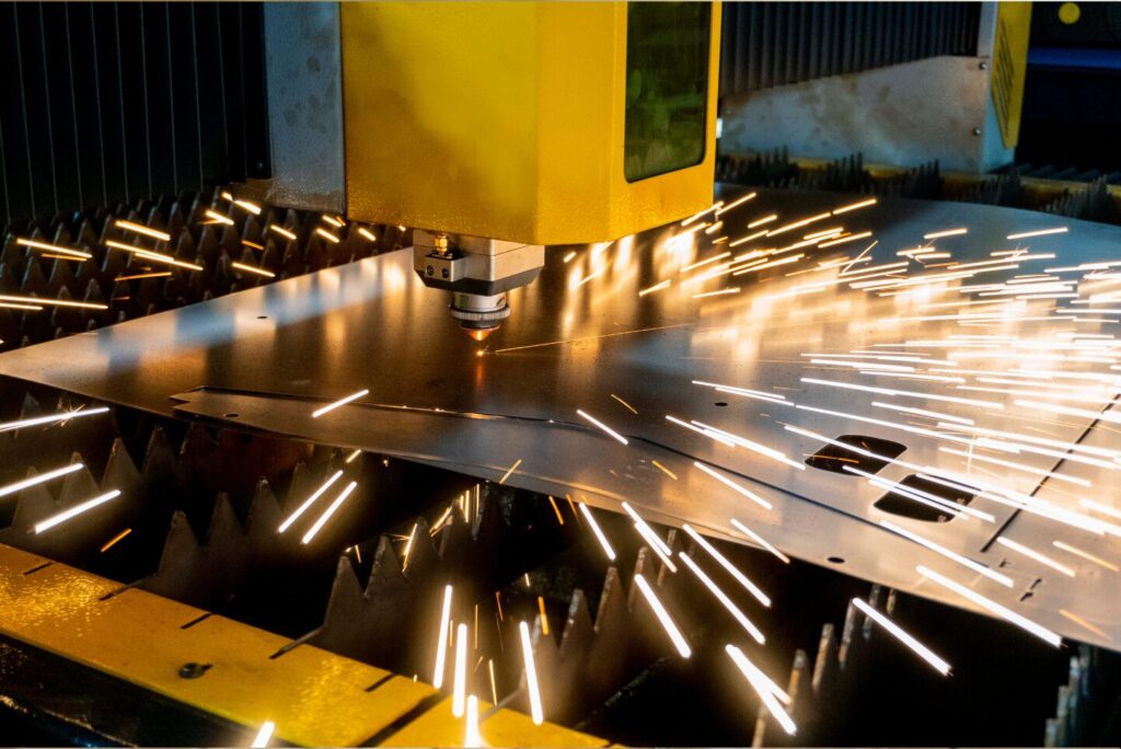 Laser cutter in Manufacturing producing sparks.