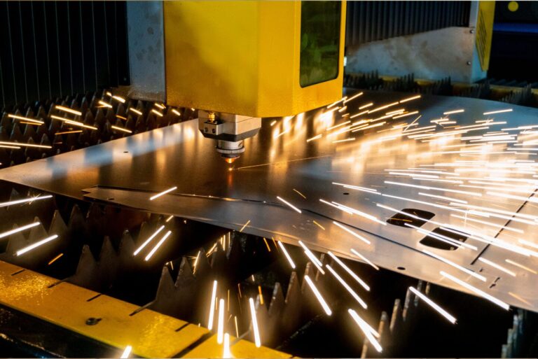 Laser cutter in Manufacturing producing sparks.