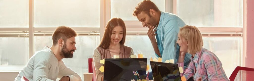 b2b web designers strategizing new website on computers