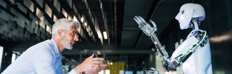 businessman talking to robot in an office