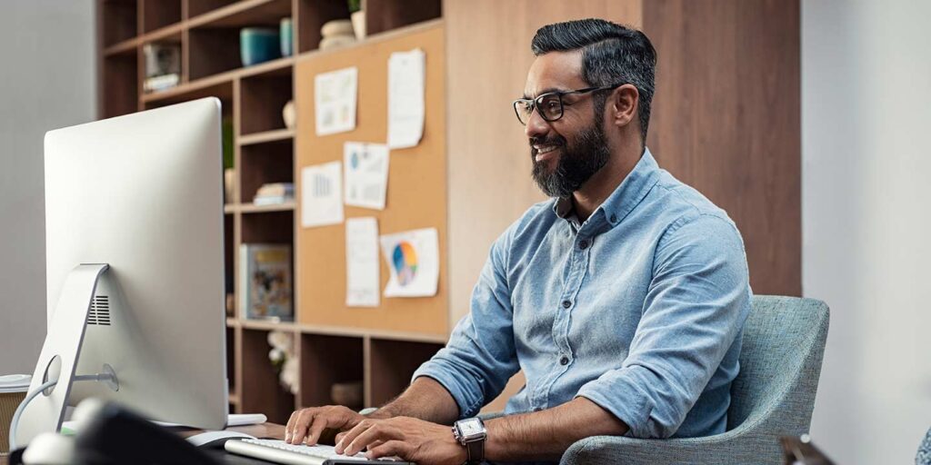 Man calculating PPC ad spend