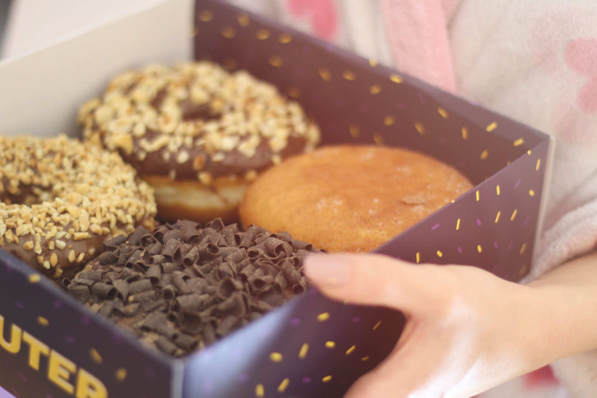 kindness with box of donuts