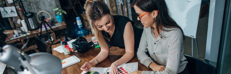 coworkers reviewing color schemes