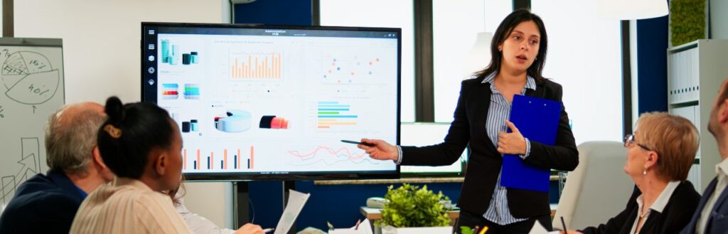 financial advisor conducting marketing analytics meeting