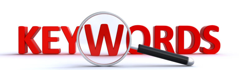 magnifying glass over KEYWORDS in red